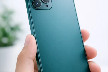 “Hand holding a teal smartphone, representing modern mobile accessories from Primebyte Shop.”